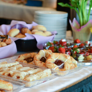 table of different pastries and fruits