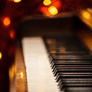 Piano covered in cobwebs