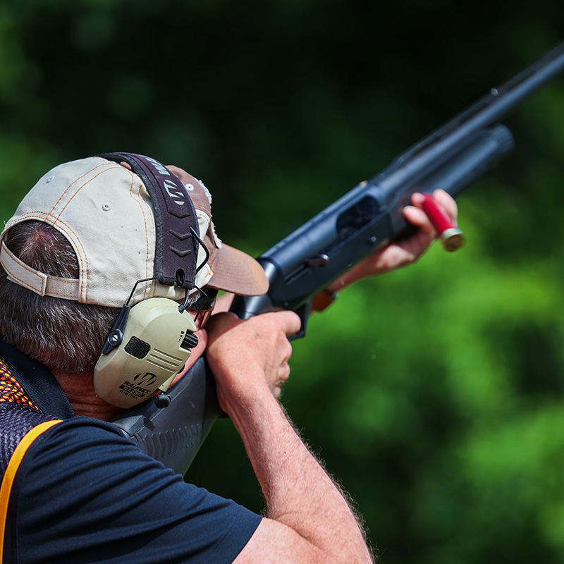 A hunter taking careful and steady aim.