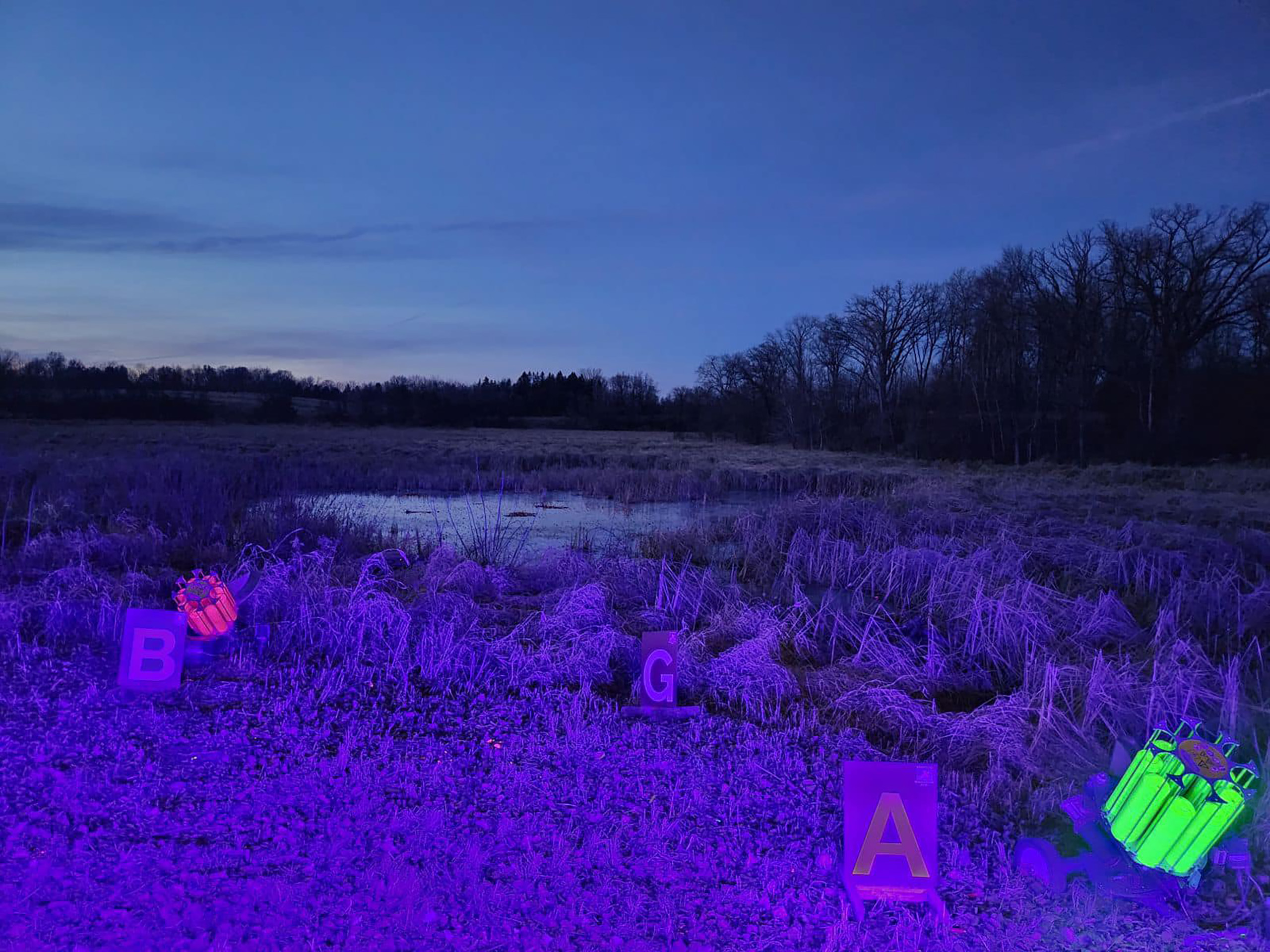 The cosmic clays set up over a pond.