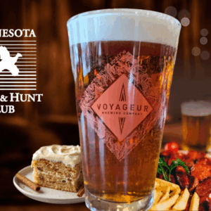 glass of beer with food around